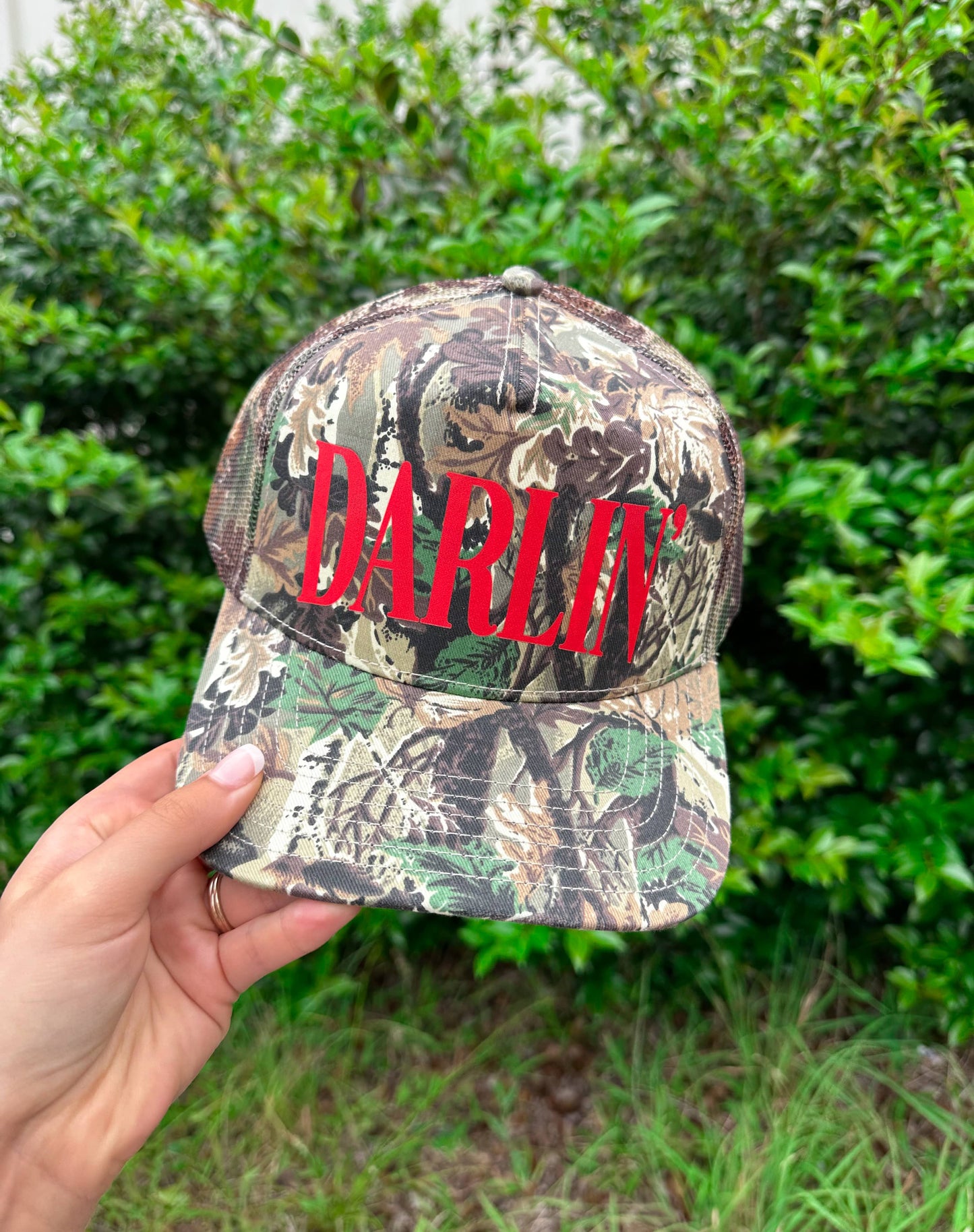 Darlin' (red font) Real Camo Canvas Trucker Hat