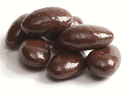Dark chocolate covered almonds close-up