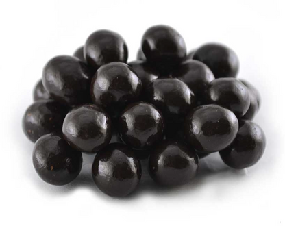 Close-up of dark chocolate coated espresso beans